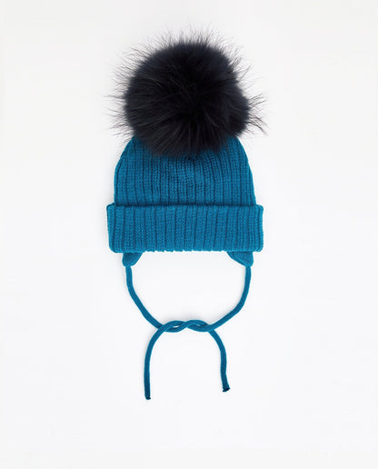 Bonnet en tricot turquoise